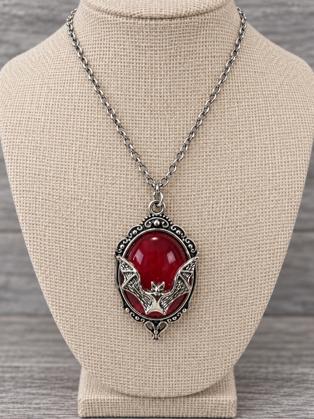 Silver Bat Pendant Necklace with Red Cabochon